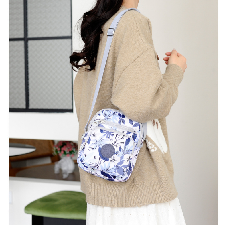 Fina Travel Backpack | Lightweight, Multi-Pocket Design, Water-Resistant Fabric 3